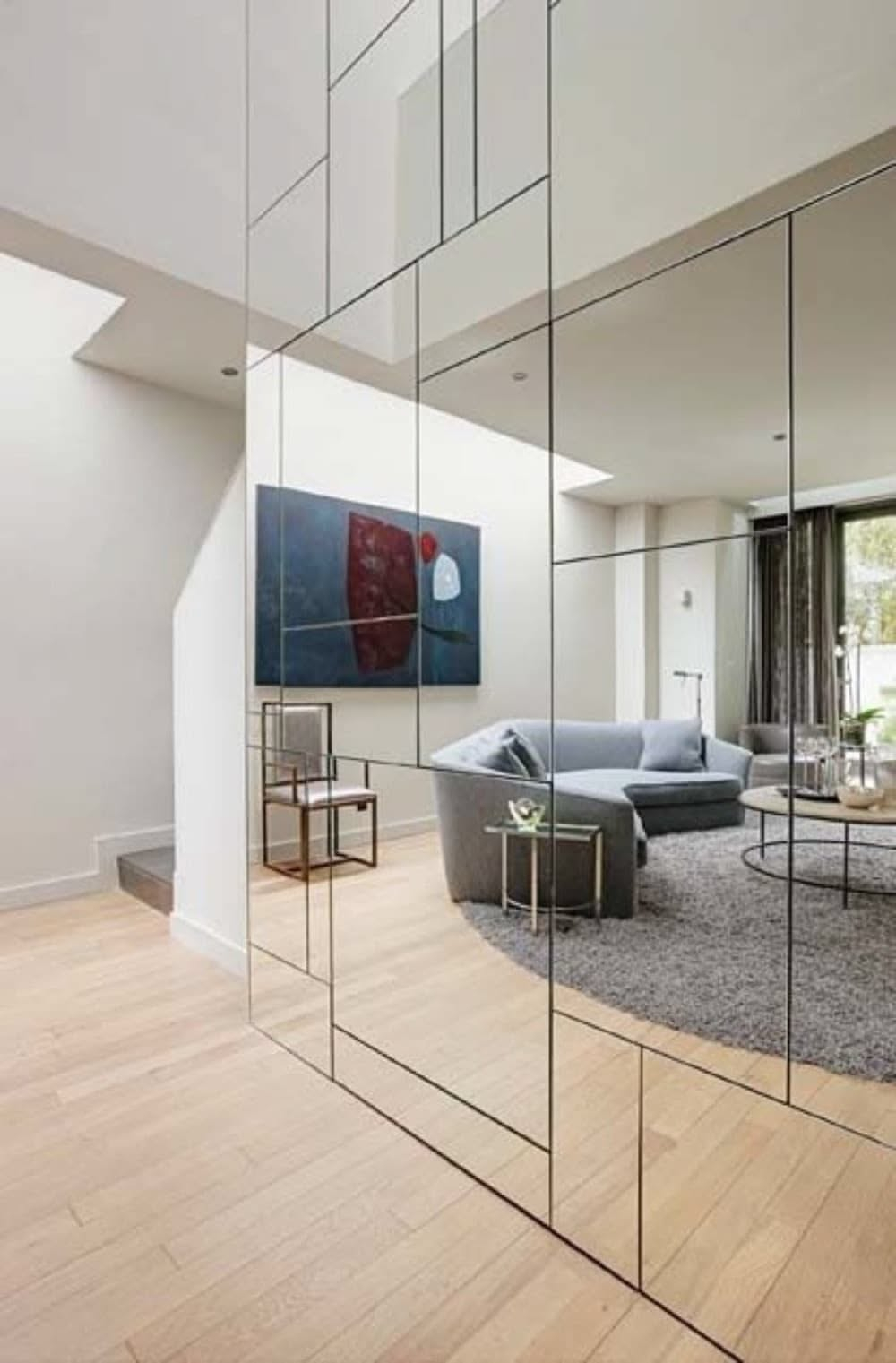 Geometric Mirrored Wall With Hidden Closets And Storage Spaces | Small ... for Why the Mirror Discipline 37 Wall Decor is Transforming Modern Interior Spaces in 2026