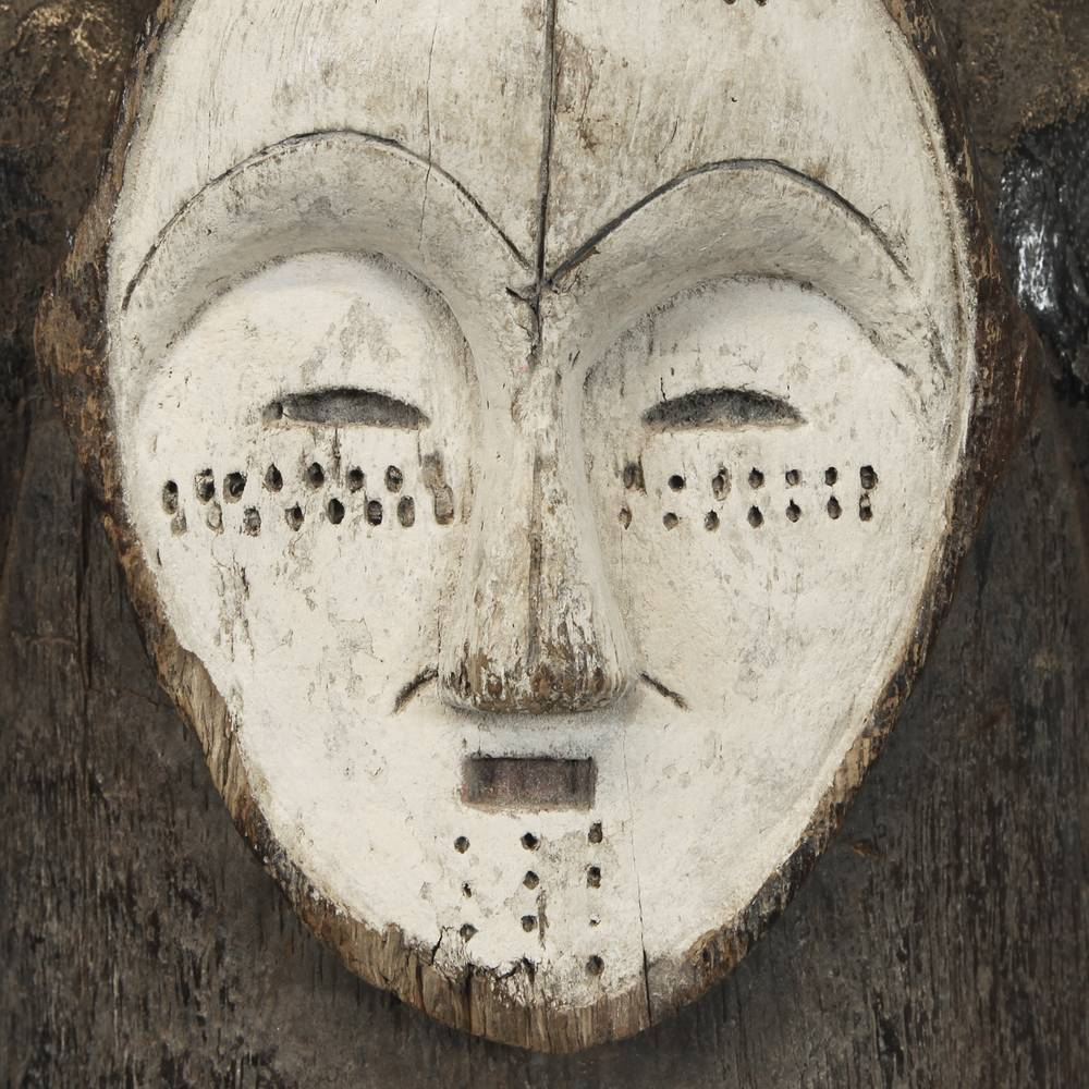 The Artistry And Significance Of Carved And Painted Gabon Fang Masks in Exploring the Rich History and Four Generations of Statuary Artistry Behind Classic Wall Masks