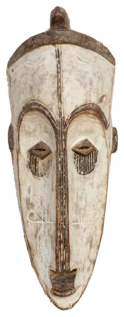 The Artistry and Significance of Carved and Painted Gabon Fang Masks