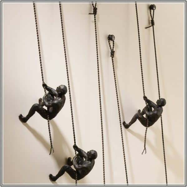 Climbing Man Wall Sculptures - House Of Denmark with Red 1-Piece Climbing Man Art Exploring Form and Function