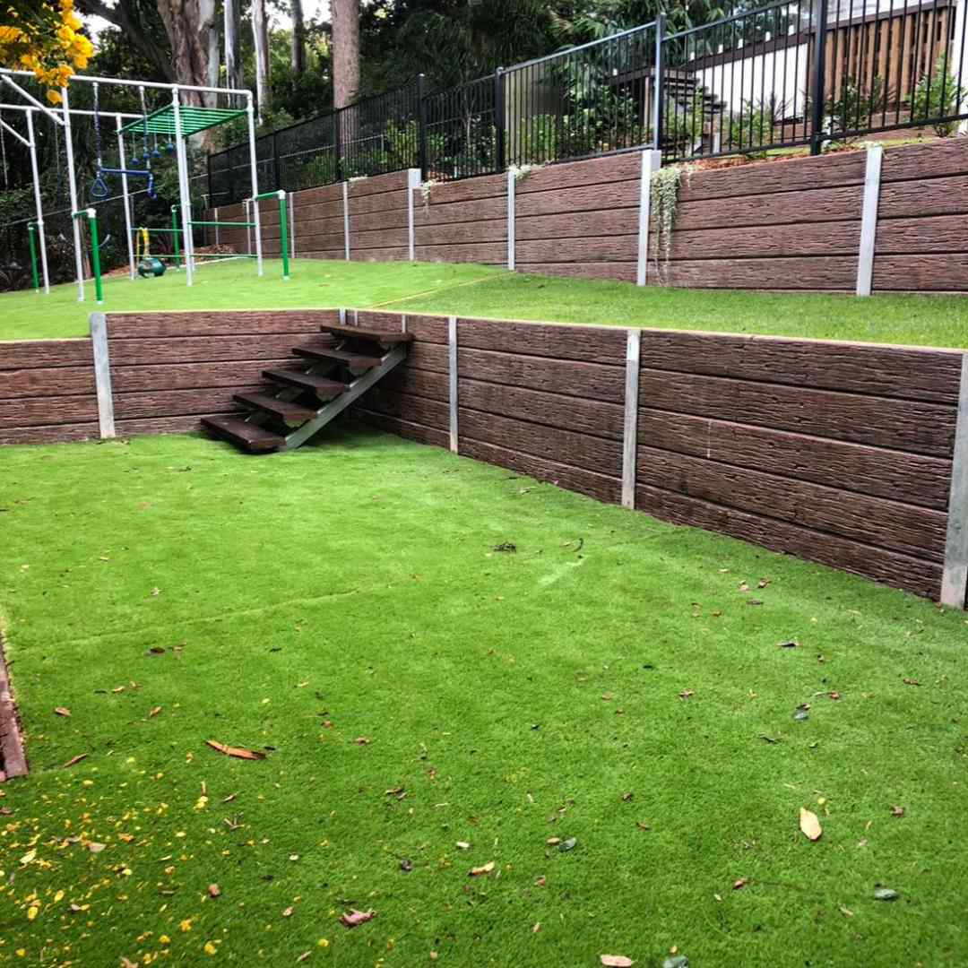 From Bland Backyard To Blooming Beauty: Transforming Brisbane Gardens ... within Transforming Gardens with Thoughtfully Designed Concrete Walls