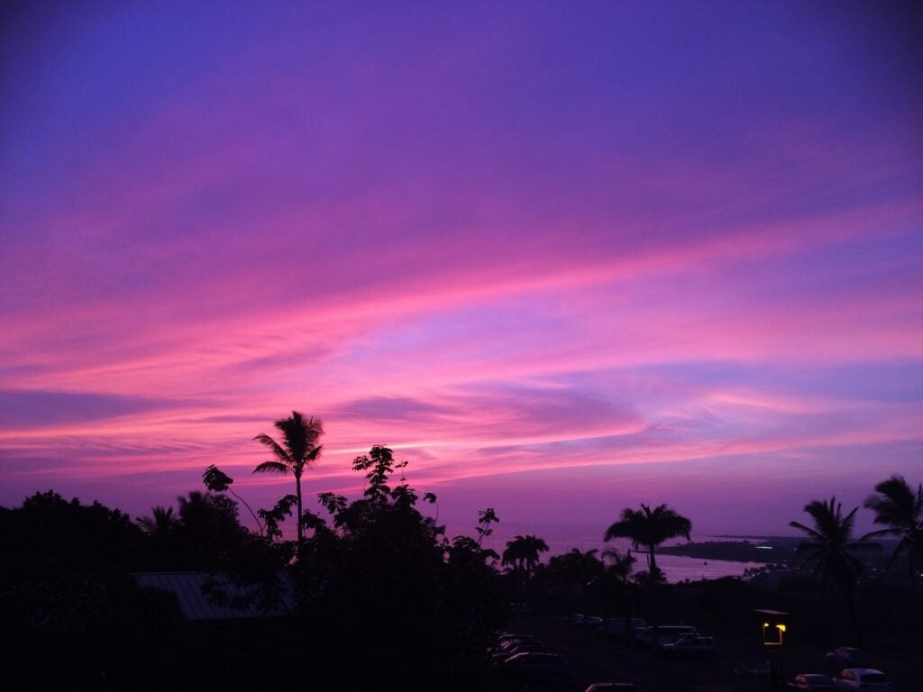 Why Tropical Sunsets Appear More Vibrant Than Others