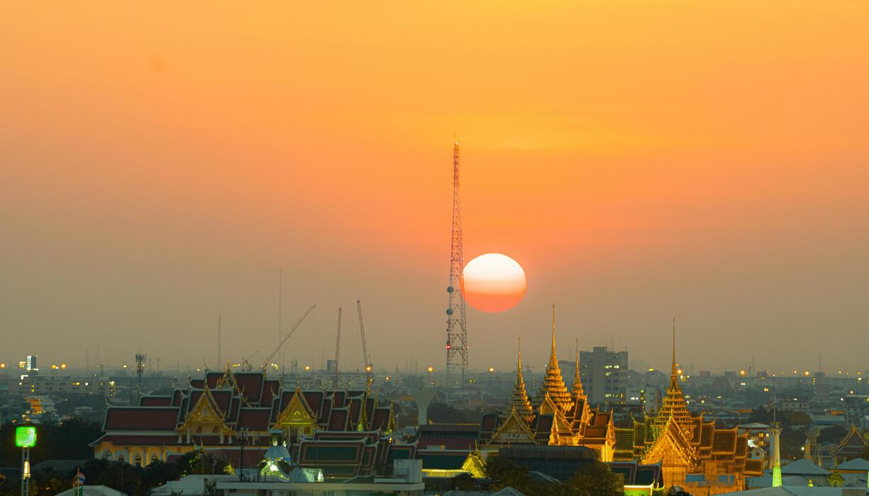 Bangkok Sunset Stock Photos, Images And Backgrounds For Free Download pertaining to The Cultural Significance Behind Bangkok's Sunset Imagery