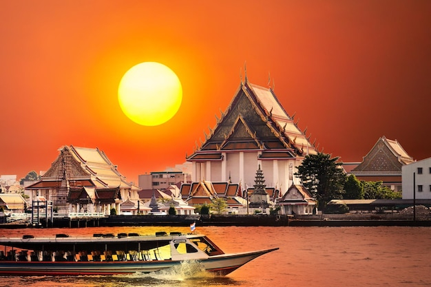 Premium Photo | Sunset In Bangkok with The Cultural Significance Behind Bangkok's Sunset Imagery