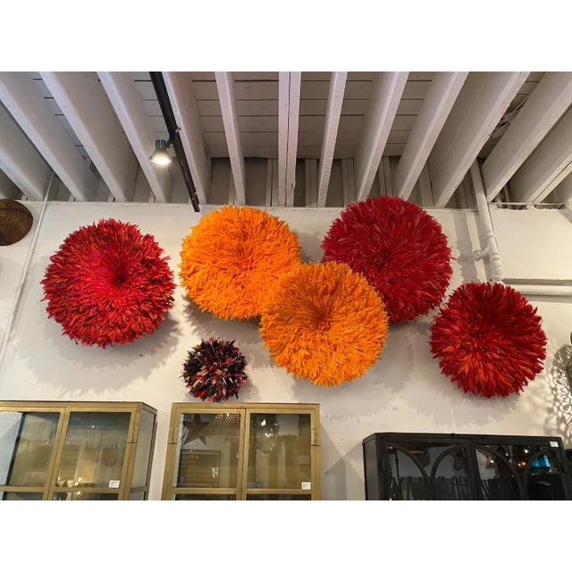 How Red Juju Hat Art Reflects African Heritage and Storytelling